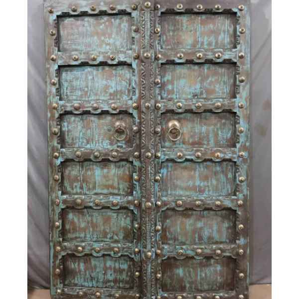 The Jannat Carved Rustic Armoire