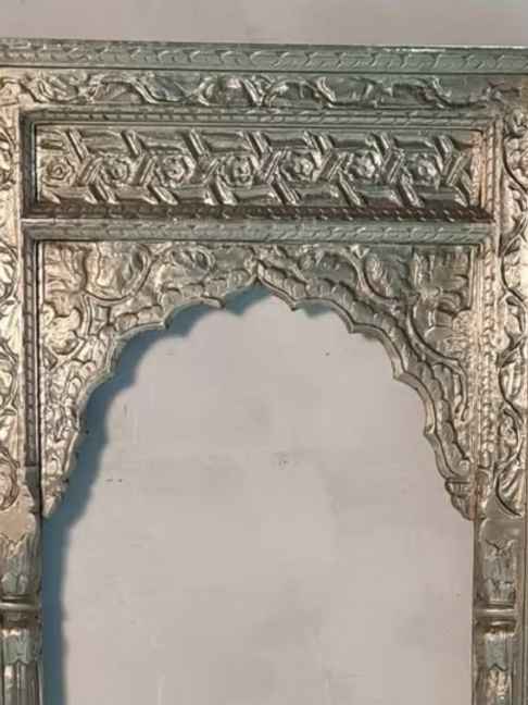 The Jannat Carved Rustic Armoire