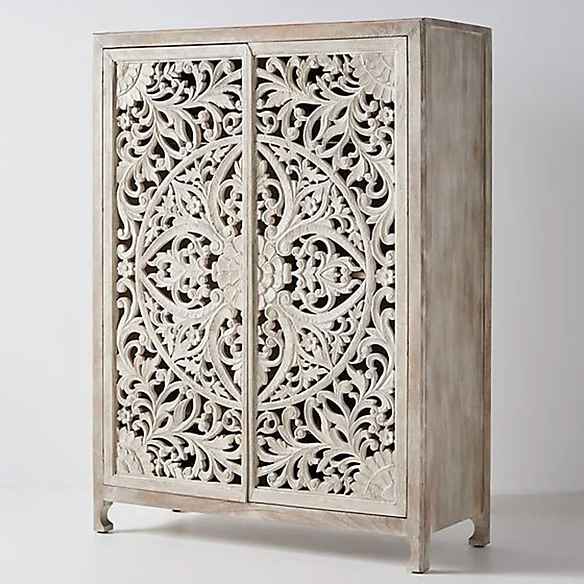 The Pranali Carved Rustic Armoire