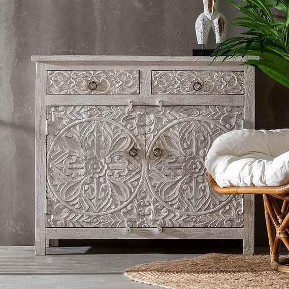 The Pranali Carved Rustic Armoire