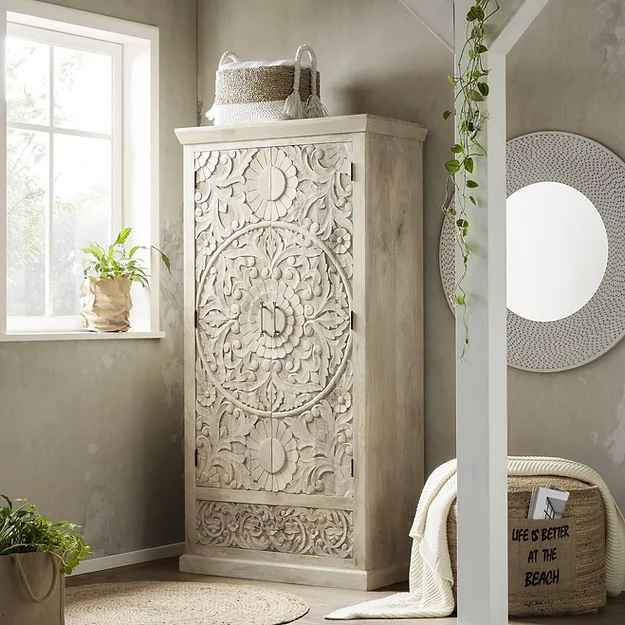 The Pranali Carved Rustic Armoire